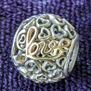 Solid 14K gold and 925 sterling silver Love Bracelet Charm By Pandora